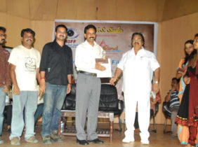 Receiving award from Dasari Narayana Rao
