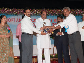 Receiving award from Ramanaidu